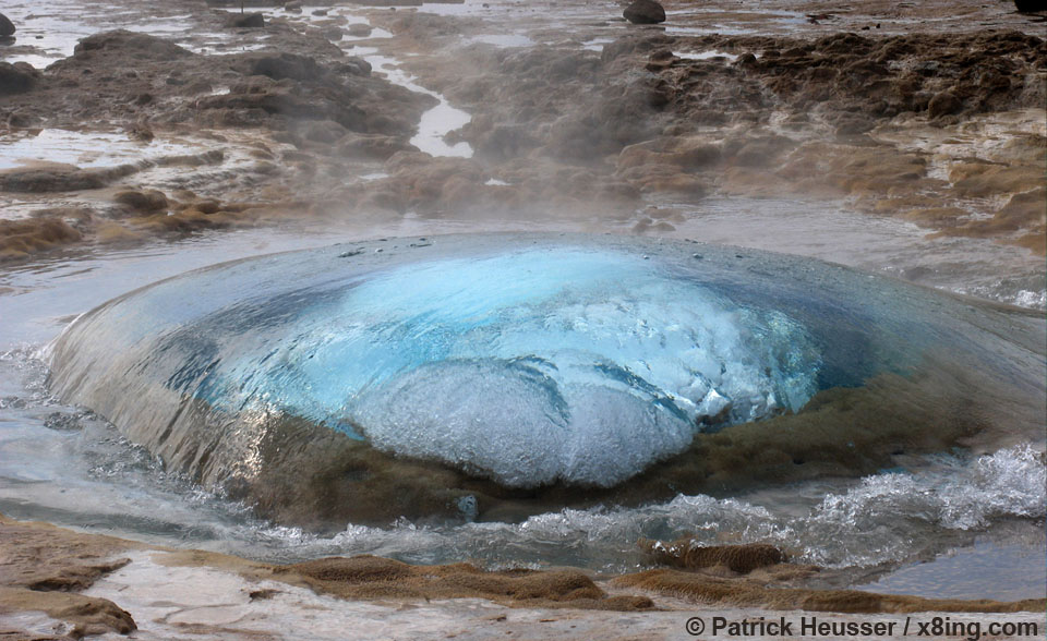 a geysir shortly before it's blowout forming a beautiful sphere