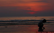 kid playing in the sunset (ko chang, thailand)